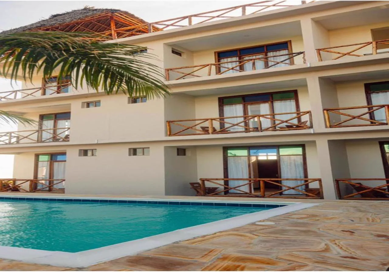 Sea View Hotel pool and balconies at sunset